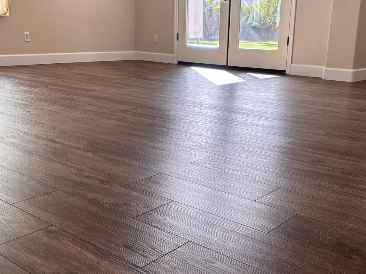 Dark LVP floor after cleaning