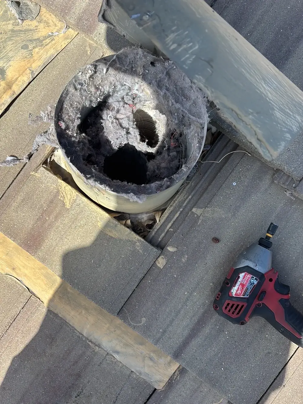 Roof pipe packed with lint