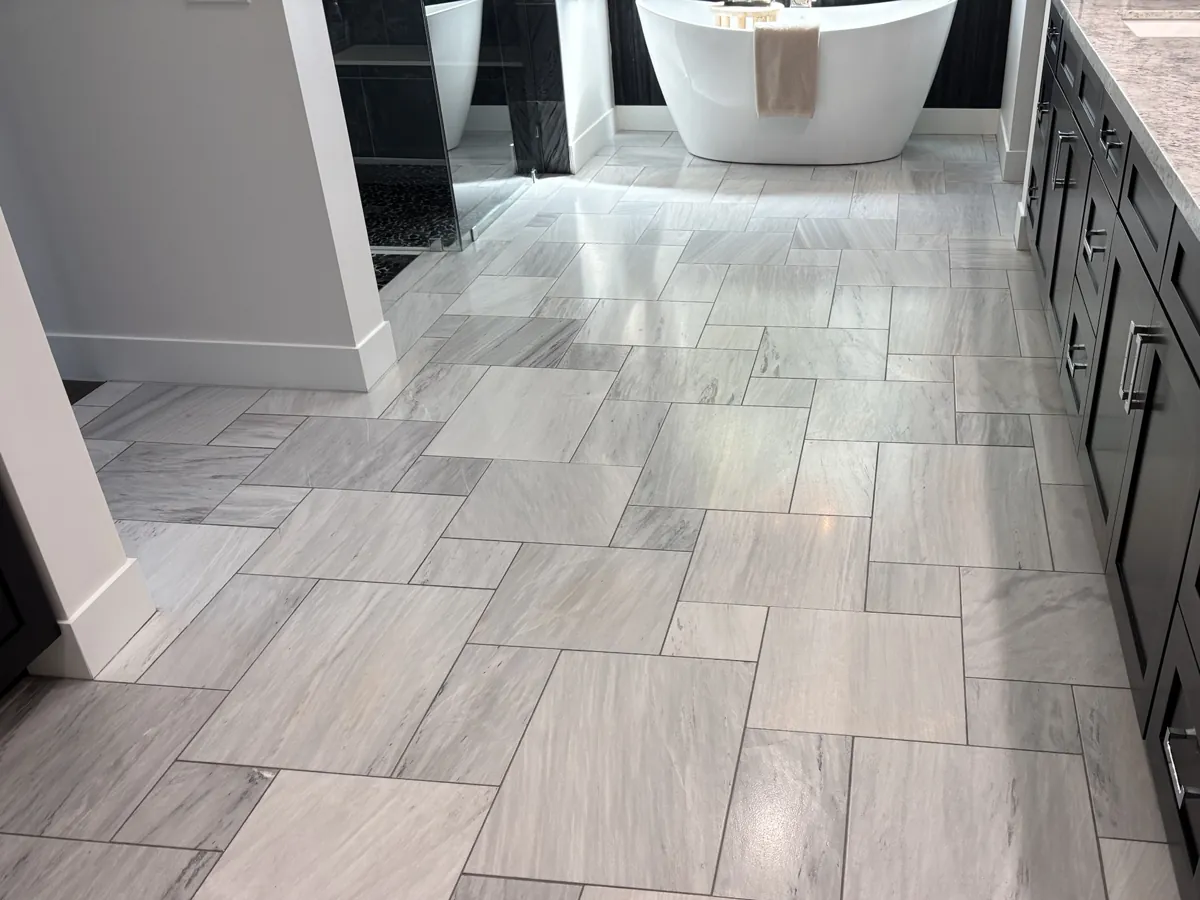 Grey marble bathroom floor after cleaning