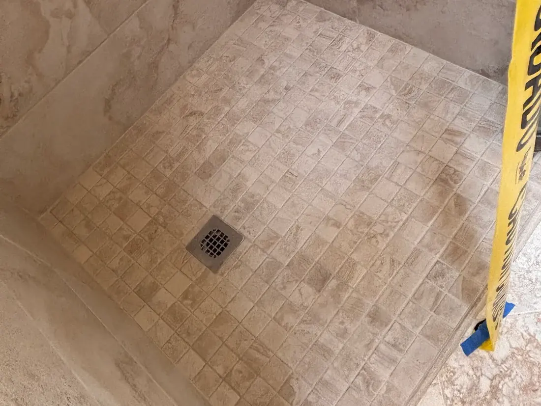 Mosaic shower pan cleaned